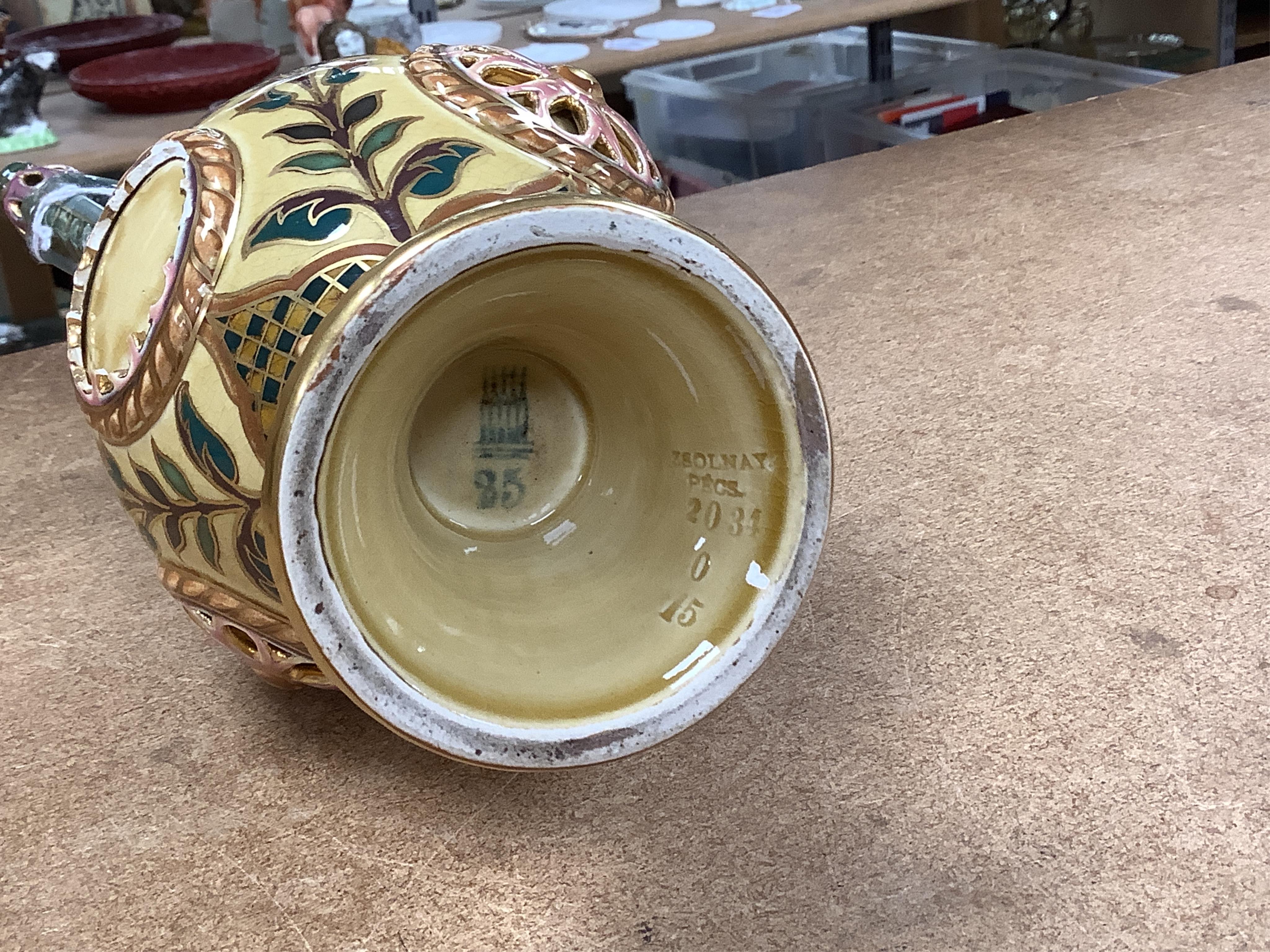 Two Zsolnay Persian inspired jugs / ewers and covers, stamped to the bases 29cm high
